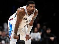 FILE - Brooklyn Nets' Kyrie Irving during the first half of an NBA basketball game against...