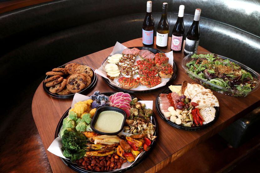 A selection of platters and wine for holiday catering at Postino in Deep Ellum.