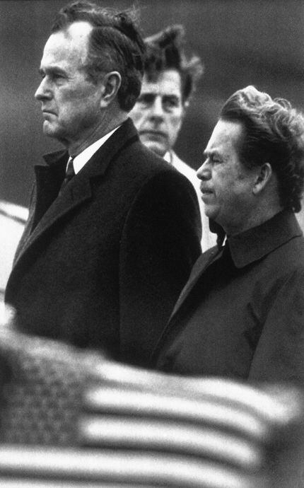 Bush stands with Czech President Vaclav Havel (right) in Prague in November 1990. 