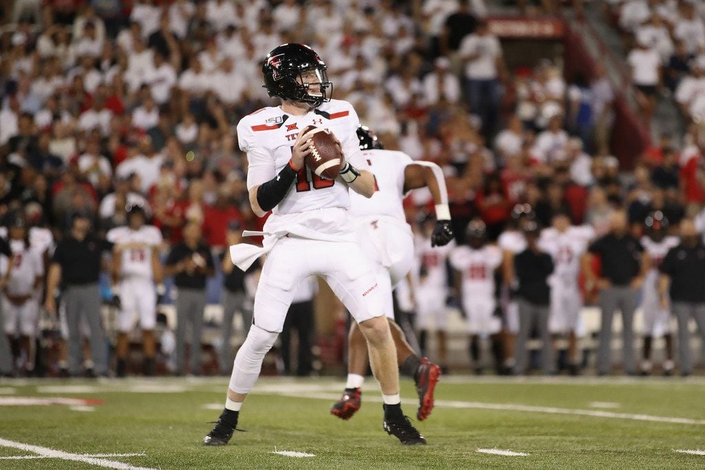 TUCSON, ARIZONA - SEPTEMBER 14:  Quarterback Alan Bowman #10 of the Texas Tech Red Raiders looks to pass during the first half of the NCAAF game against the Arizona Wildcats at Arizona Stadium on September 14, 2019 in Tucson, Arizona. 