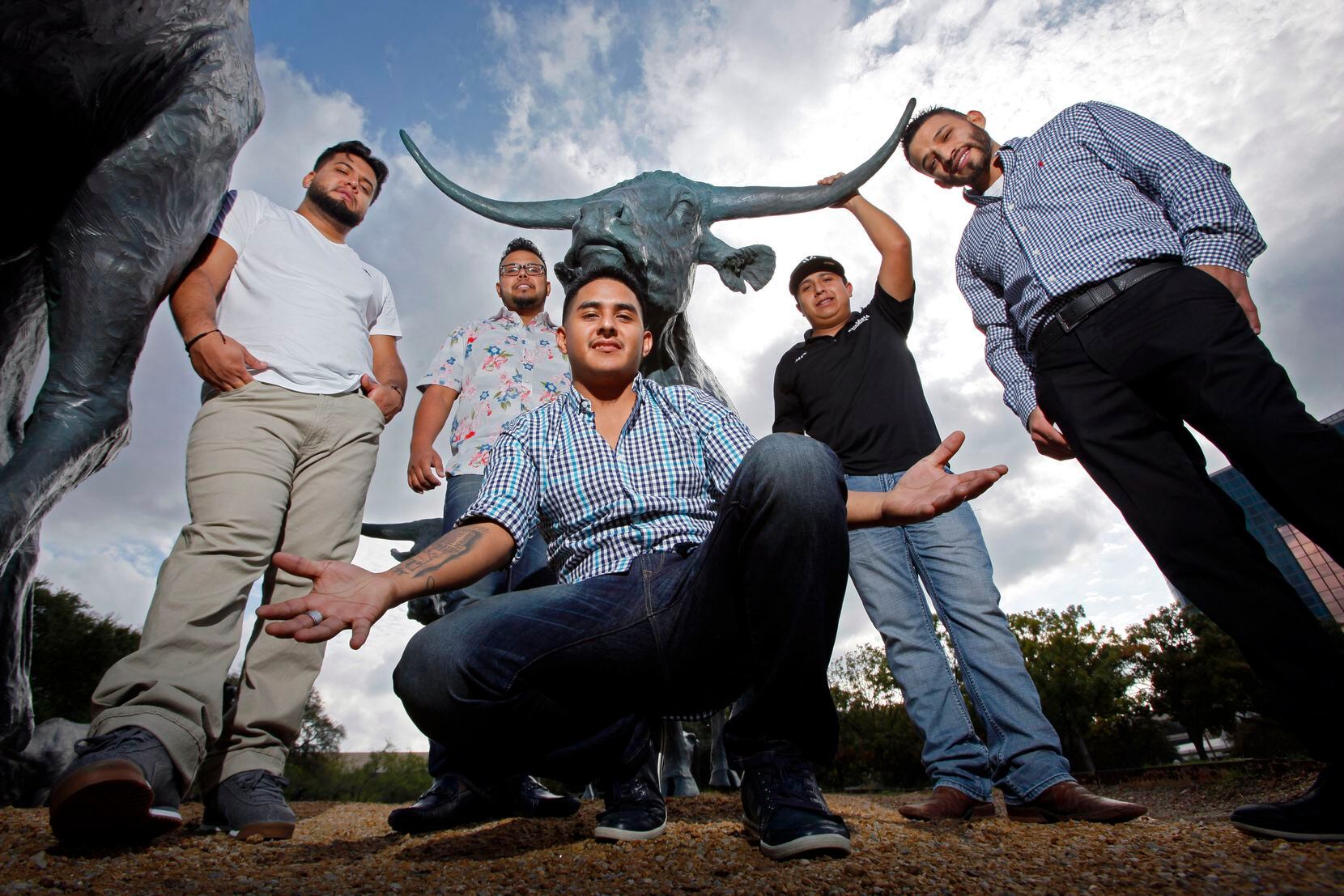From left to right, Mike Lopez, Adrian Zamarripa, Moises Cuevas, Alex Mu–iz and Israel Oviedo, of the Latin music group La Energia Norteña on Wednesday, Nov. 04, 2015 in Downtown Dallas.