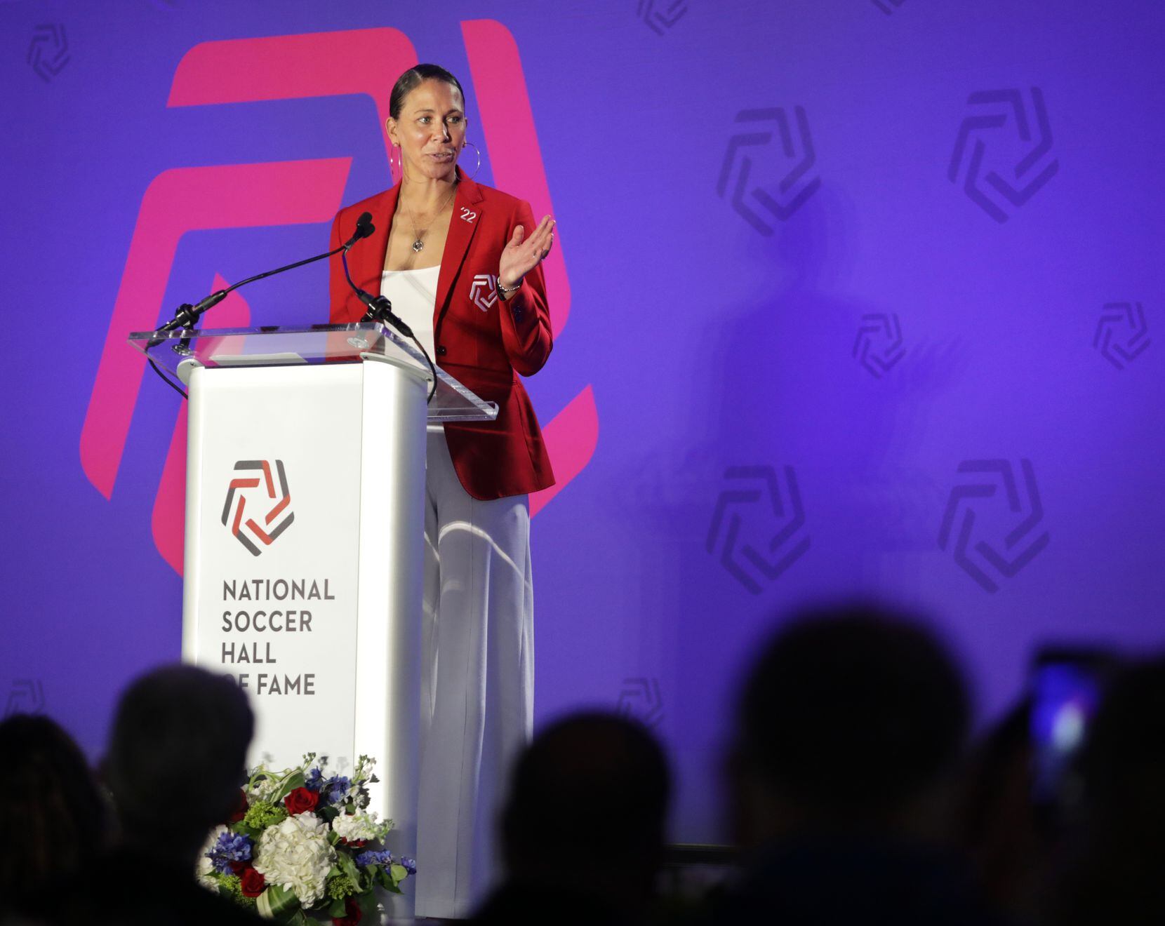 Shannon Boxx delivers a speech during the National Soccer Hall of Fame ceremony at Toyota...
