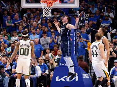 Dallas Mavericks guard Luka Doncic (77) floats in a shoot against the Utah Jazz during the...