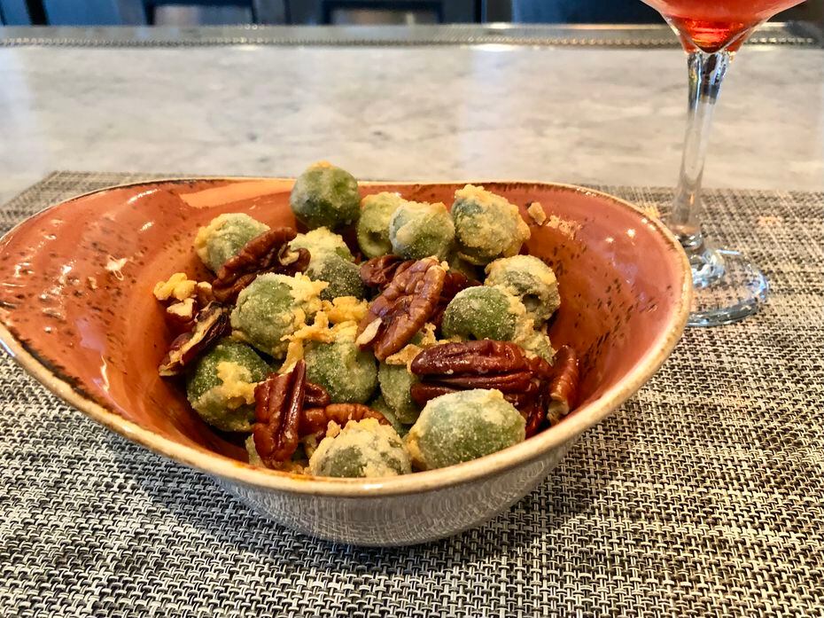 The Texas pecans and crisp-fried Castelvetrano olives at Gemma.
