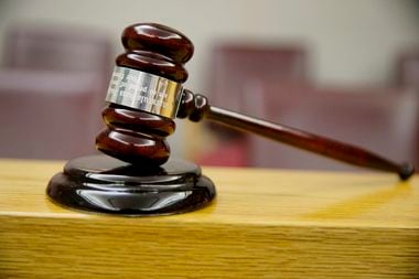 Stock art of a gavel in a courtroom in the Frank Crowley Courts Building in Dallas 