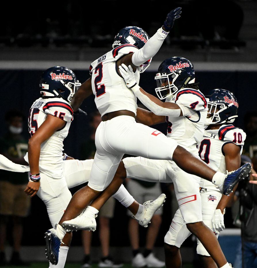 Denton Ryan’s Kalib Hicks (2) celebrates his rushing touchdown with Khalon Davis (15) nd Jordyn Bailey in the first half during a high school football game between Longview and Denton Ryan, Saturday, Aug. 28, 2021, in Frisco, Texas. (Matt Strasen/Special Contributor)