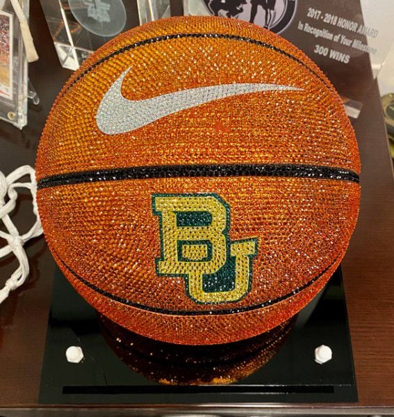 Nike co-founder Phil Knight sent a life-sized crystal basketball with the Baylor logo.