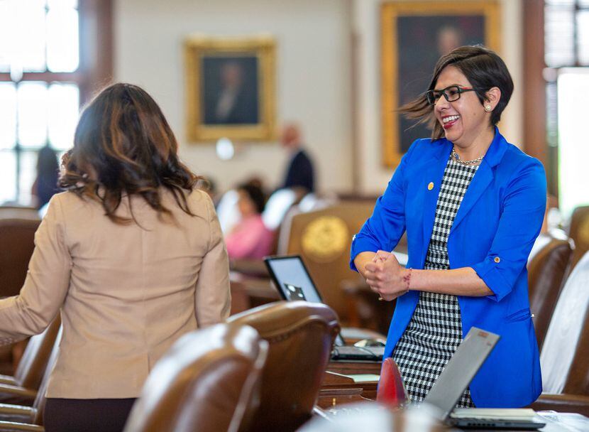 State Rep. Jessica González (right) chatted with Rep. Nicole Collier of Fort Worth on the...