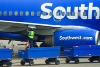 A Southwest Airlines plane is refueled at Pittsburgh International Airport on Tuesday, April...