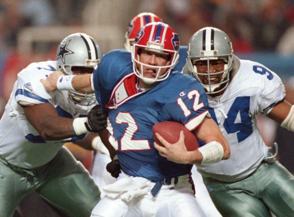 Jim  Jeffcoat (L) and Charles Haley(R) sack Bills quarterback Jim Kelly.
