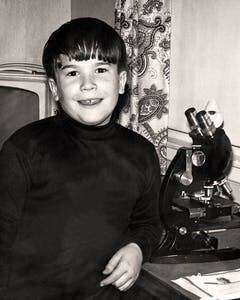 Peter Hotez, around age 10, with his microscope.