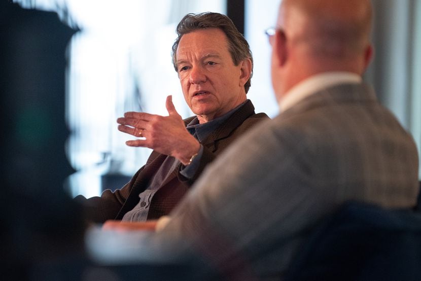 Pulitzer Prize winning author Lawrence Wright, left, speaks with moderator Robert Wilonsky...
