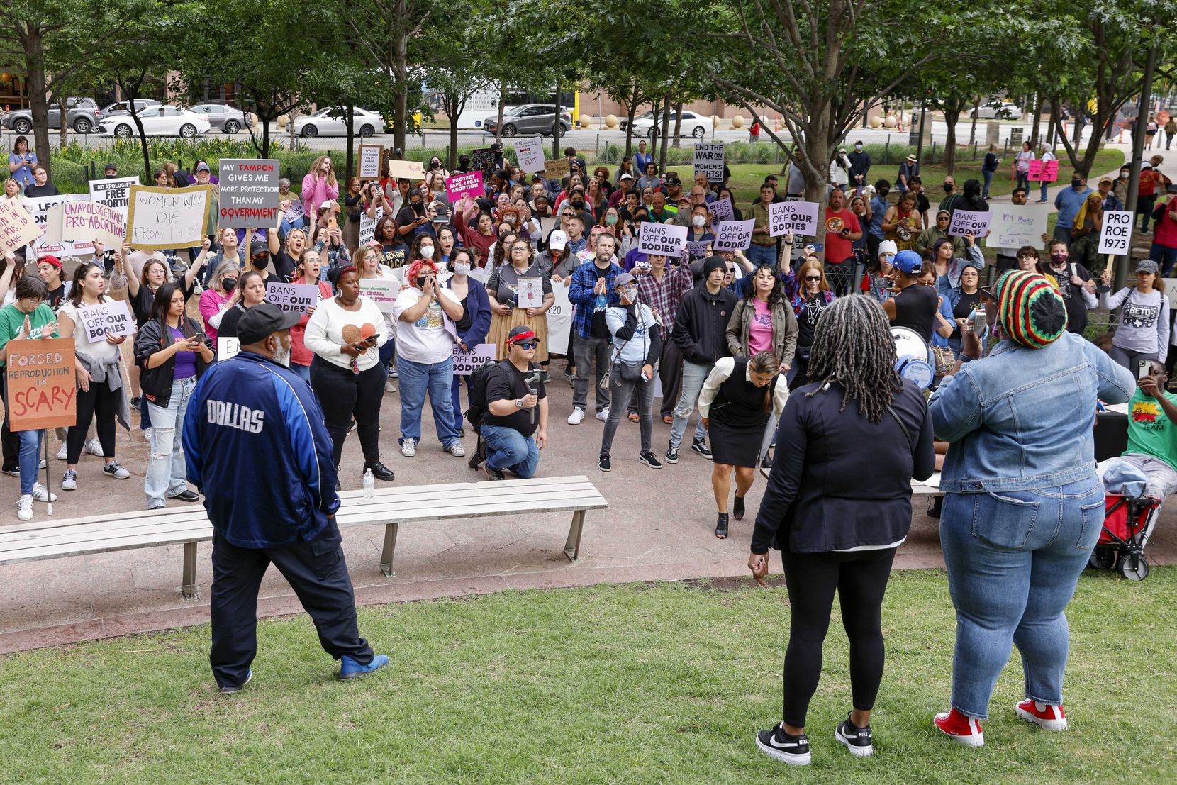 Abortion rights supporters listened to a speaker during a rally at Civic Garden in downtown...
