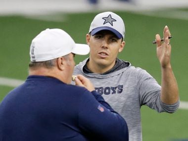 Dallas Cowboys head coach Mike McCarthy talks with Dallas Cowboys offensive coordinator Kellen Moore in practice during training camp at the Dallas Cowboys headquarters at The Star in Frisco, Texas on Friday, August 28, 2020.