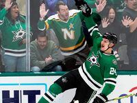Dallas Stars center Roope Hintz celebrates his goal during the second period of an NHL...