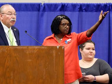 Texas Democratic Party Chairman Gilberto Hinojosa (left) and Adoneca Fortier listen to...
