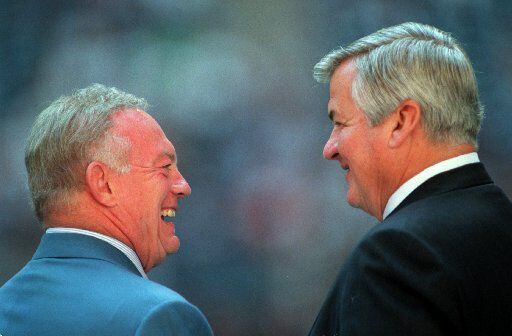 10-11-98 -- Dallas Cowboys owner Jerry Jones, left,  talks to Carolina Panthers owner Jerry...