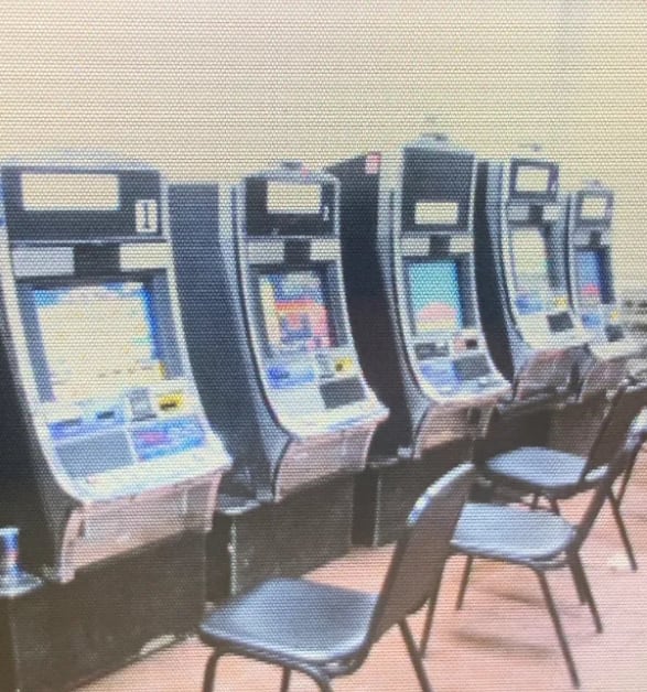 An image provided by Dallas police of a Northwest Dallas gambling operation that was shut down by the department's vice unit in late February 2020. Five machines and $17,000 in cash were seized as a result.