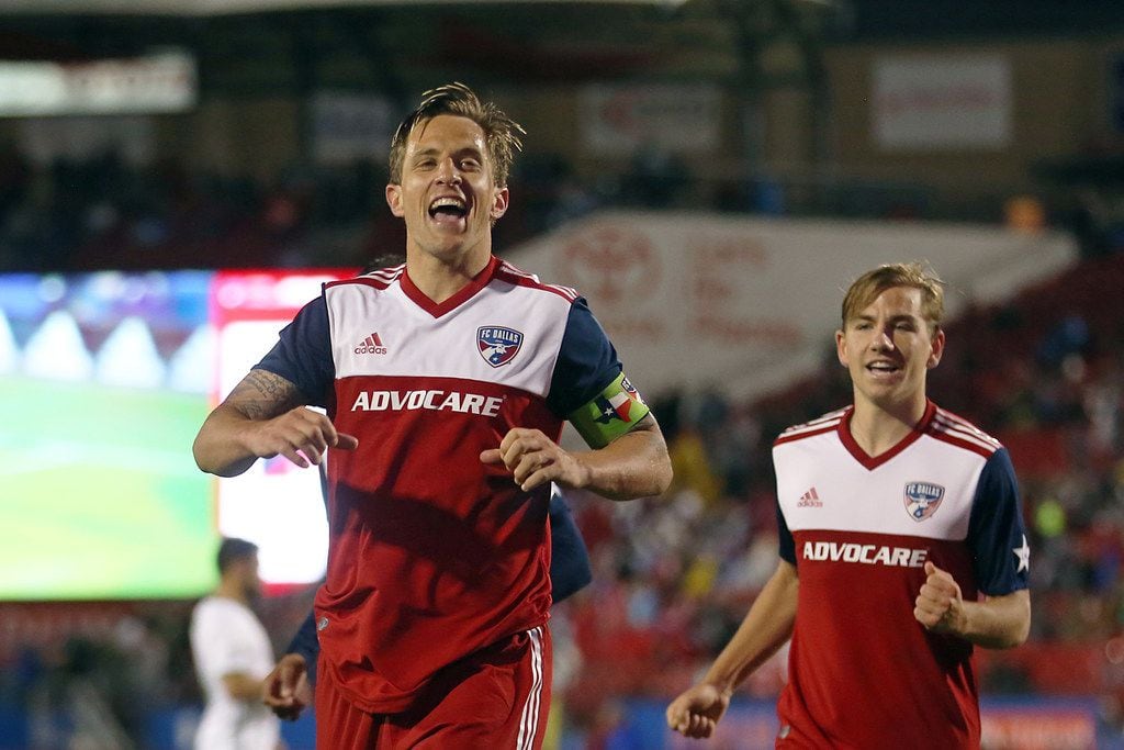 Frisco, Texas: Reto Ziegler #3 of FC Dallas celebrtate after scores during game between FC...