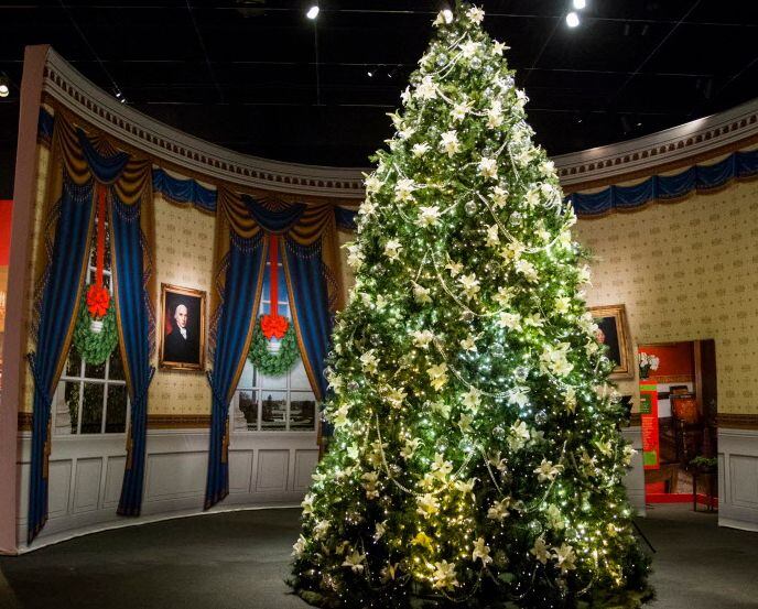 A Christmas tree reminiscent of the 2005 tree in the Blue Room of the White House is...