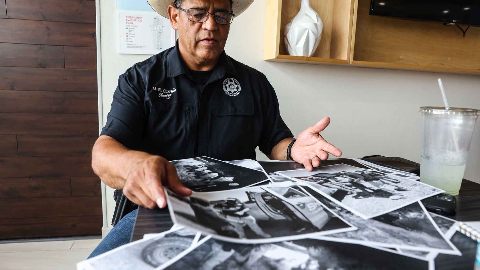 Culberson County Sheriff Oscar Carrillo shows photos of the work his office in Van Horn does...