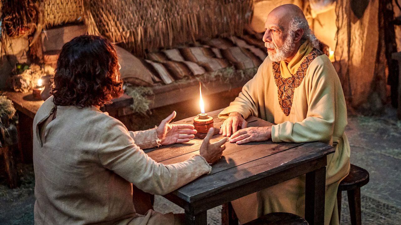Jesus (Jonathan Roumie) and Nicodemus (Erick Avari) visit in a scene from the first season of The Chosen.