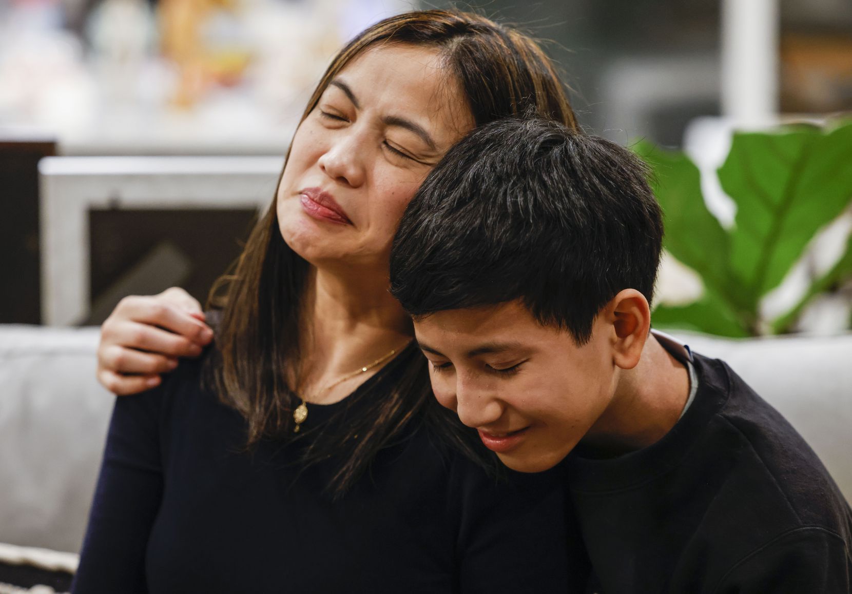 Oldest son JP Termulo, 15, embraces his mother, Ana, while talking about his late sister,...