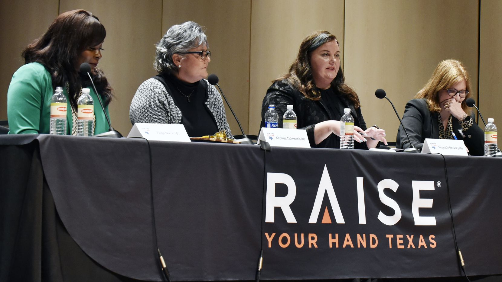 Candidates for the Texas House District 65 speak during a candidate forum hosted by Raise...