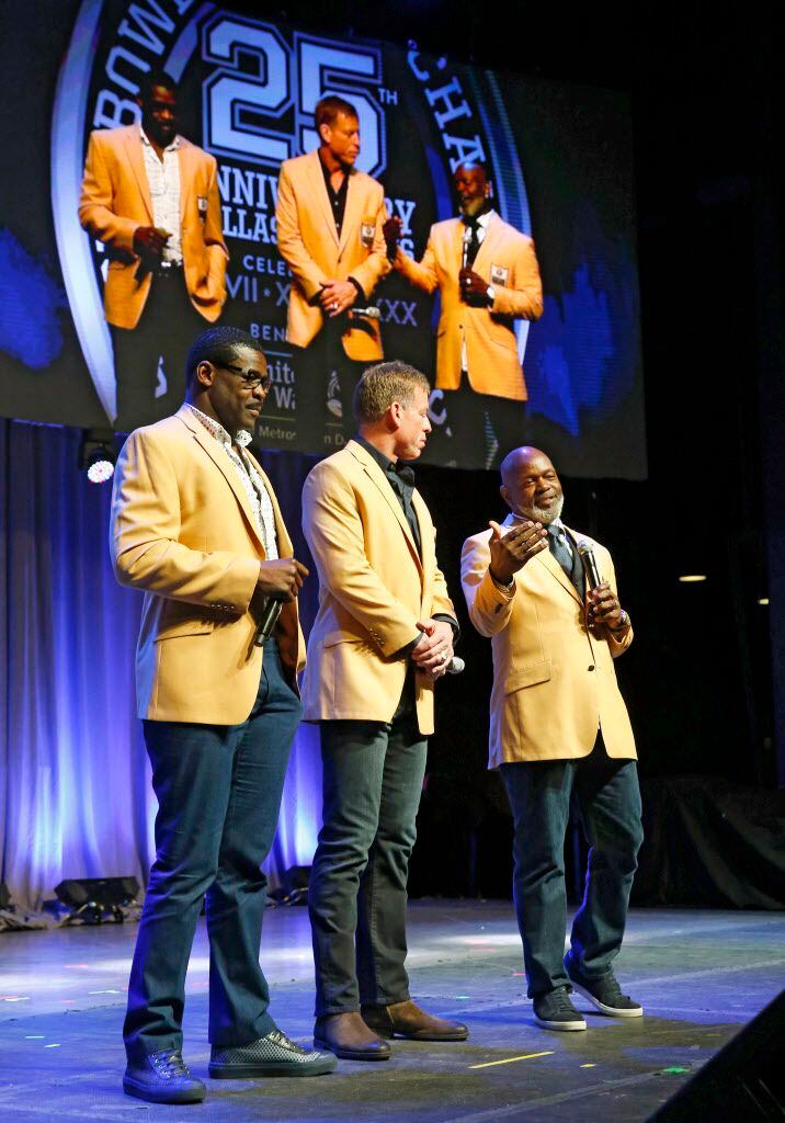 Former Dallas Cowboys triplets (from left) Michael Irvin, Troy Aikman and Emmitt Smith speak...