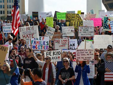 Thousands showed up to protest for immigrant and refugee communities in downtown Dallas on...