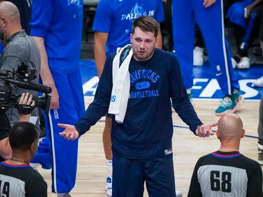 Dallas Mavericks guard Luka Doncic argues for a call during the first half in Game 5 of a...