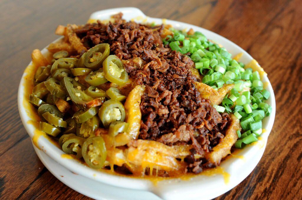 The fully loaded cheddar fries features hand-cut Idaho potato fries with aged Wisconsin...