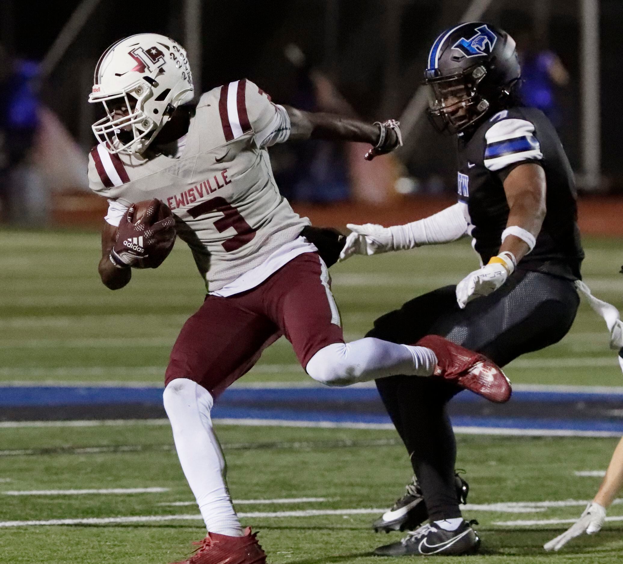 Lewisville High School wide receiver Tye Miller (3) turns to run after the catch in front of...
