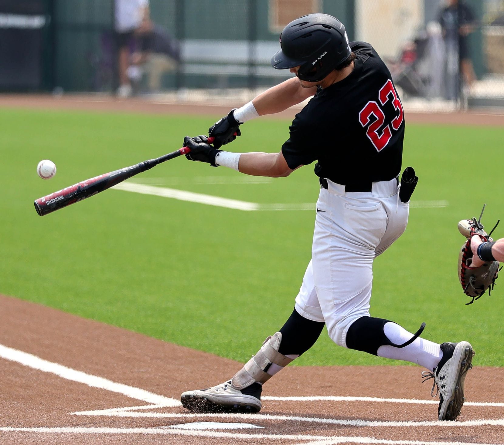 Coppell catcher Walker Pollk connects with a double against Prosper during game 3 of the 6A...