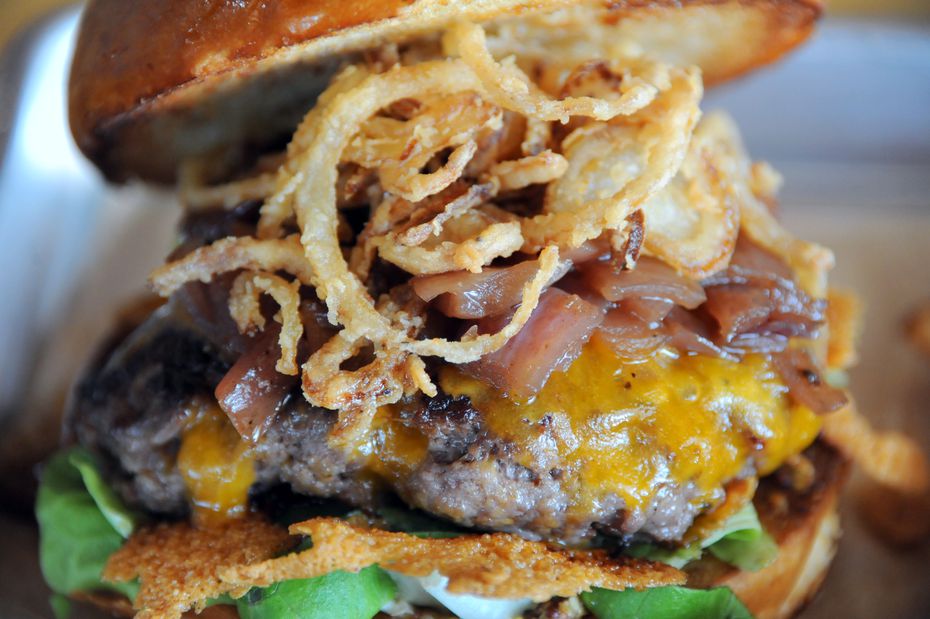 BrainDead Brewing's coma burger at comes with a house-ground brisket and bacon patty,...