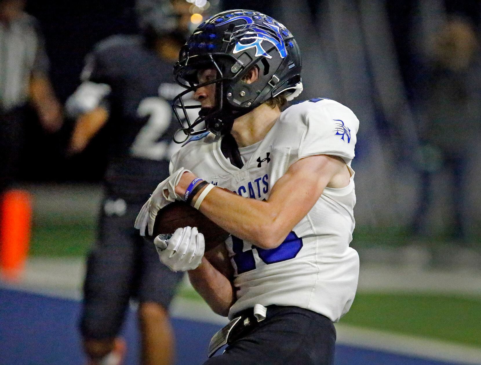 Byron Nelson High School wide receiver Kurt Ippolito (18) catches a touchdown pass during...