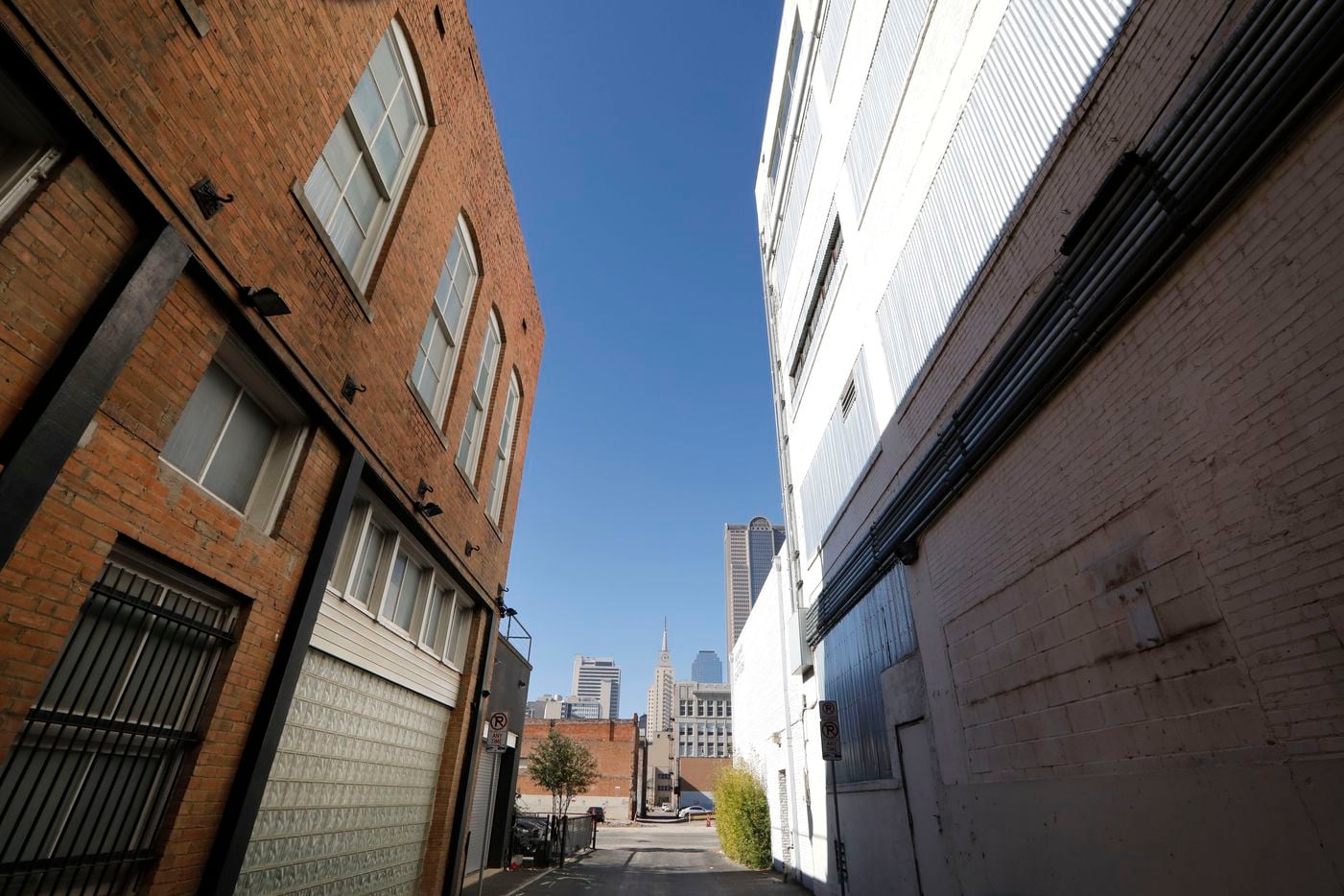 The Munger Cadillac building, left, and the building on the right, is part of the twenty-four buildings Todd Interests is buying in downtown Dallas.
