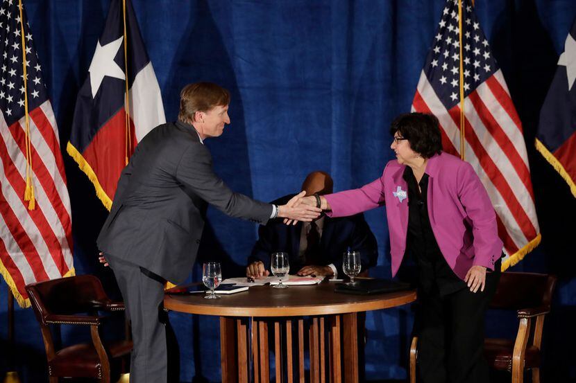 Texas Democratic gubernatorial candidates Andrew White (left) and Lupe Valdez (right) shake...