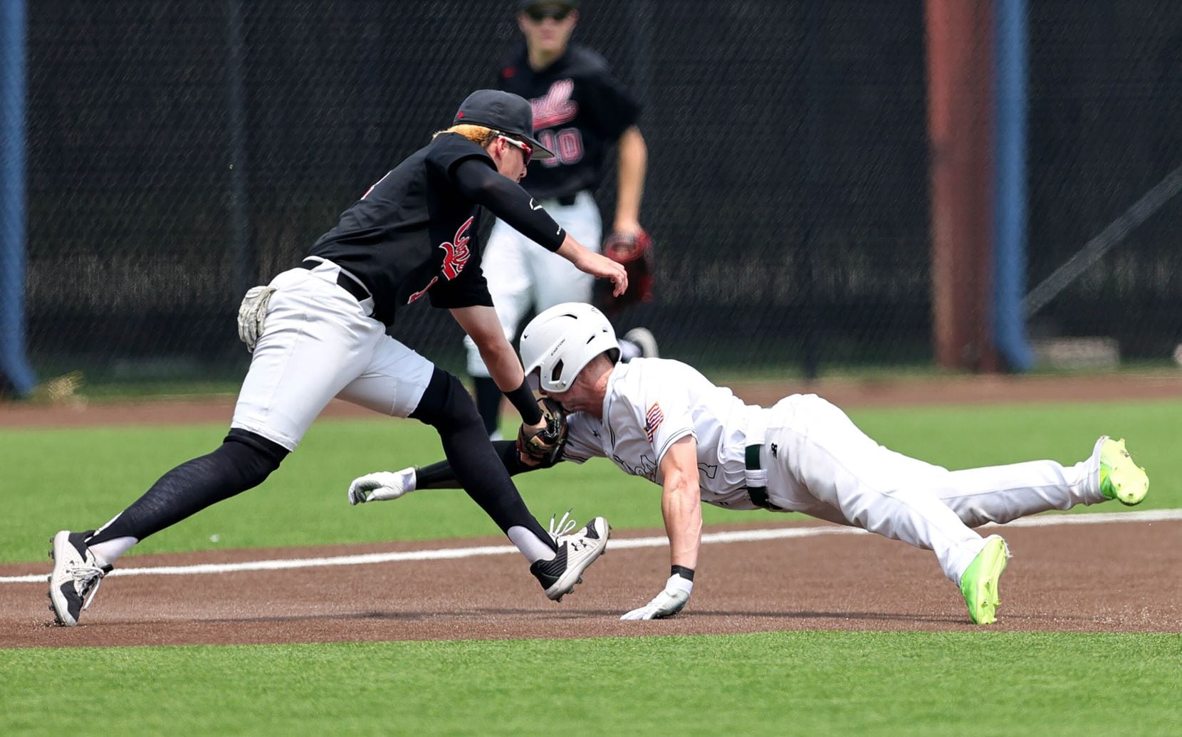 Coppell third baseman Tanner Sever (left) tags out Prosper outfielder Jacob Nelson going to...