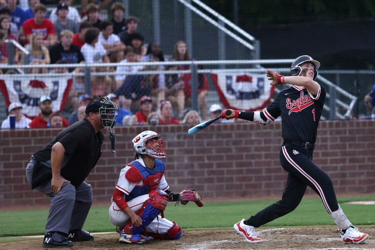Argyle High School player Grady Emerson hits a foul ball during a game against Grapevine...