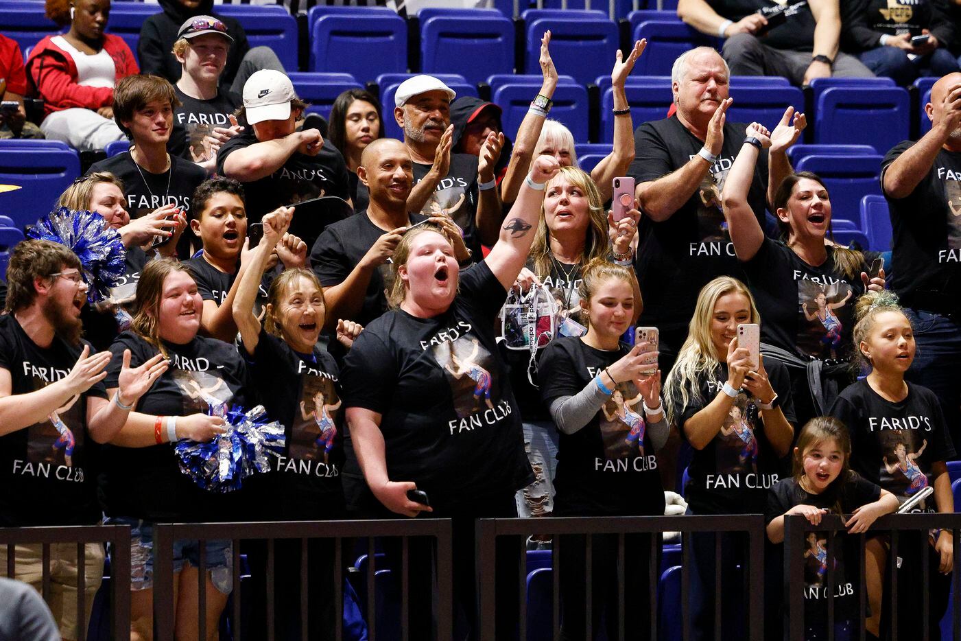 Fans cheer and celebrate Farid Mobarak of Plano West’s win in the championship match of the...