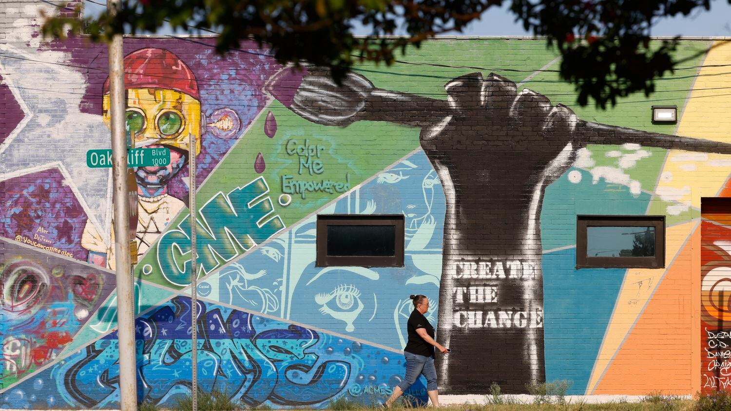 One of the murals painted on small-business operations along West Clarendon Drive, a central...
