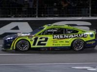 Ryan Blaney, driver of the #12 Menards / Wrangler Ford car finishes first to capture a trip...