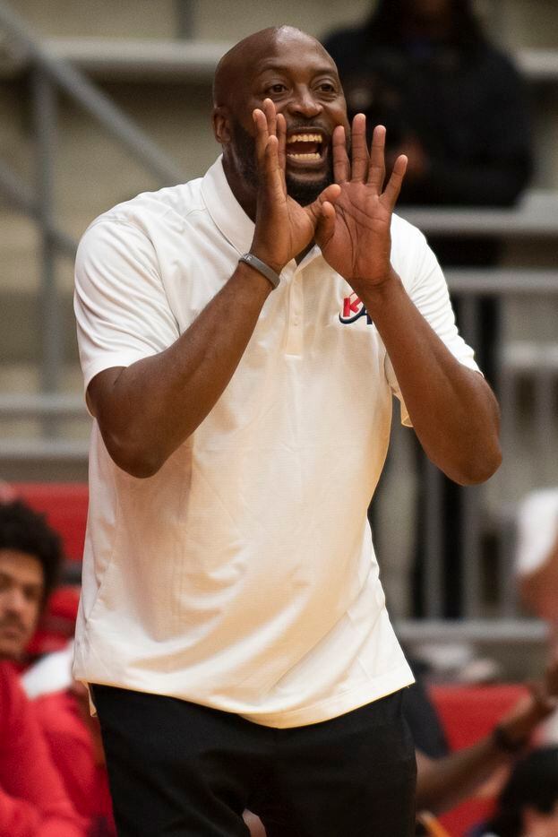 Kimball Head Coach Nick Smith directs his players from the bench during Kimball's Thanksgiving Hoopfest game against North Little Rock at Sandra Meadows Memorial Arena in Duncanville, Texas on Friday, November 26, 2021. (Emil Lippe/Special Contributor)