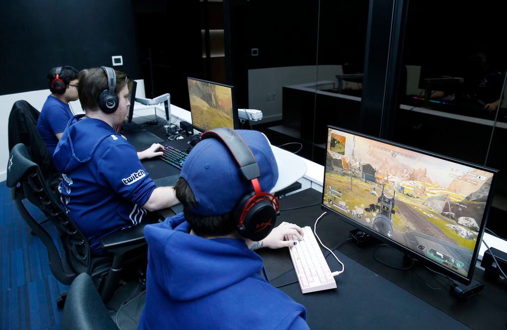 The Complexity Gaming Apex Legends Bowen "Monsoon" Fuller (right) competes in Apex Legends with his teammates Ryan "Meerko" Amato (center), and Ryan "Reptar" Boyd (left) at Complexity Gaming headquarters inside the GameStop Performance Center at The Star, in Frisco on Thursday, March 5, 2020.