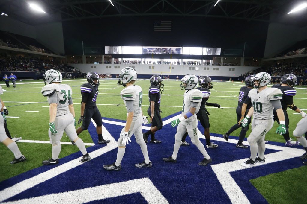 Independence High School and Reedy High School meet at the 50 yard line after playing in the...