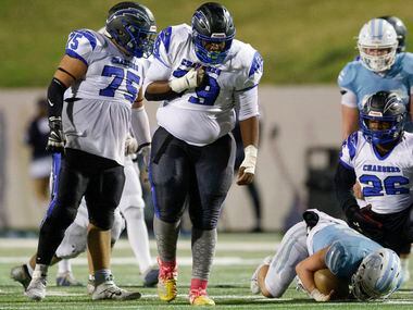 Dallas Christian defensive lineman Devontay High (79) pounds his chest after sacking Houston...