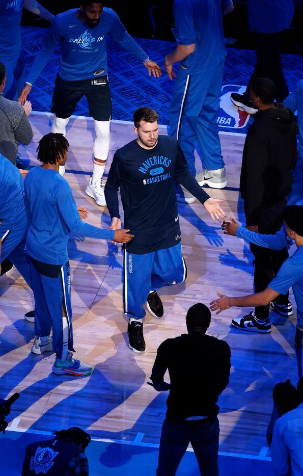 Dallas Mavericks guard Luka Doncic (77) is introduced before Game 5 of an NBA first-round...