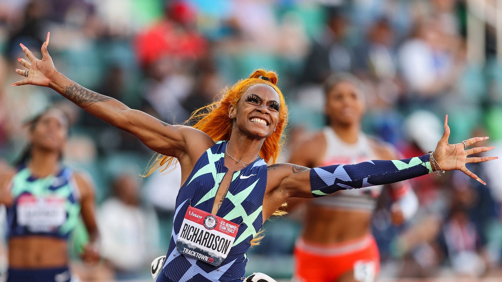 Sha'Carri Richardson celebrates winning the Women's 100 Meter final on day 2 of the 2020...