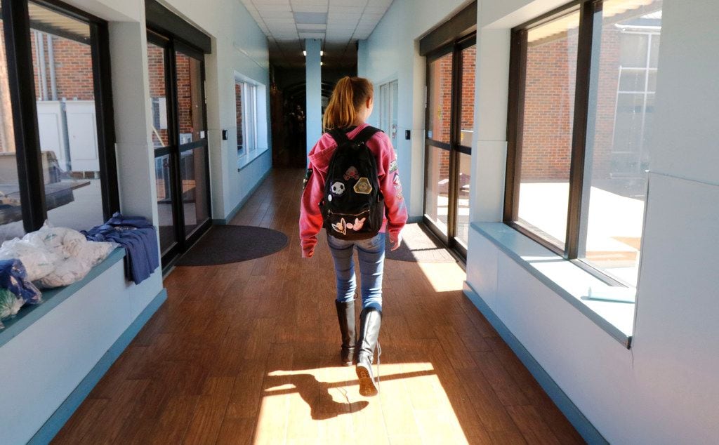 A student walks to class at Harrold School on Friday, March 2, 2018.